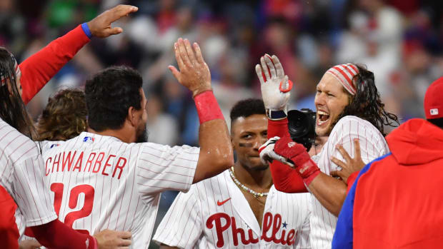 Sep 22, 2023; Philadelphia, Pennsylvania, USA; Philadelphia Phillies first baseman Alec Bohm (28) celebrates his walk-off single with teammates during the tenth inning against the New York Mets at Citizens Bank Park. Mandatory Credit: Eric Hartline-USA TODAY Sports